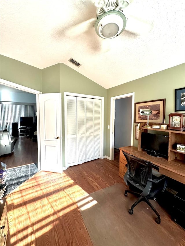 4797 N Lena Dr, Beverly Hills, FL 34465 - office space featuring wood finished floors, visible vents, a textured ceiling, and vaulted ceiling
