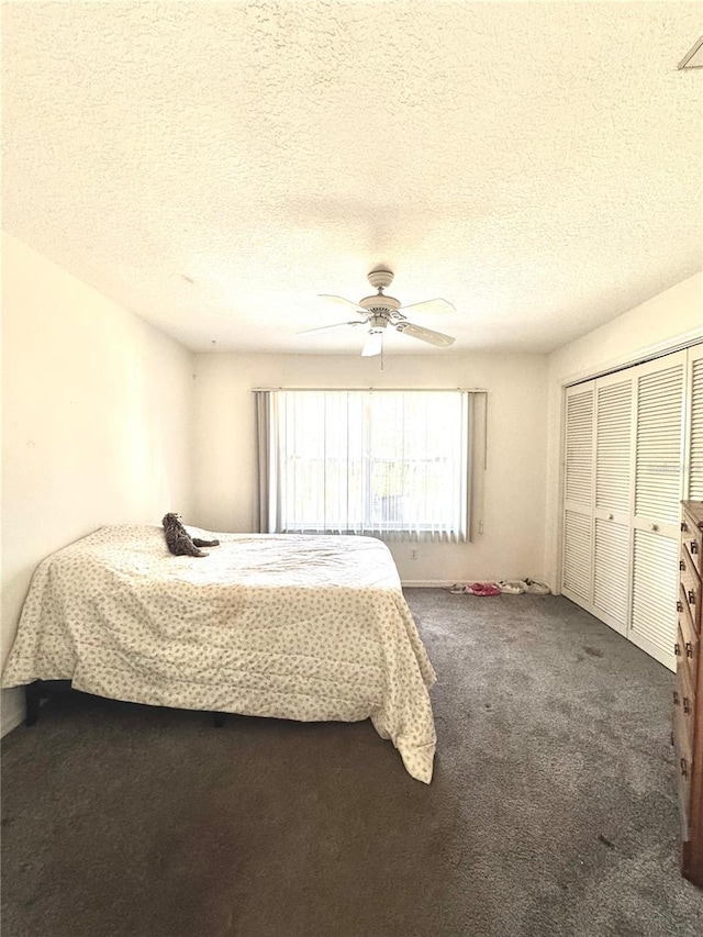 4797 N Lena Dr, Beverly Hills, FL 34465 - bedroom featuring a ceiling fan, a closet, a textured ceiling, and carpet