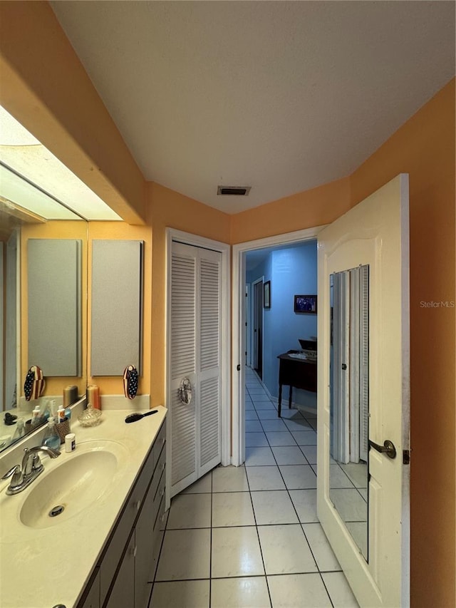 4797 N Lena Dr, Beverly Hills, FL 34465 - bathroom featuring visible vents, tile patterned floors, and vanity