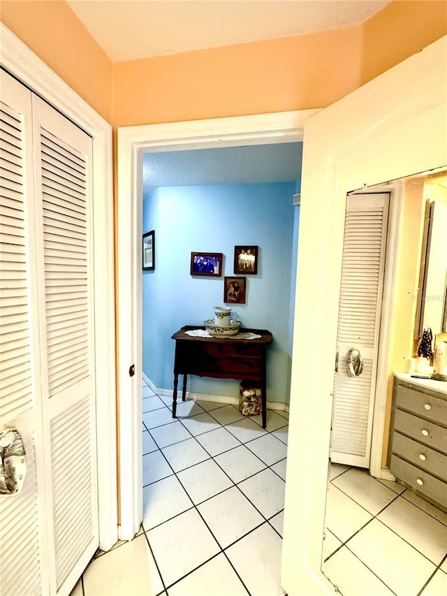 4797 N Lena Dr, Beverly Hills, FL 34465 - corridor featuring light tile patterned flooring