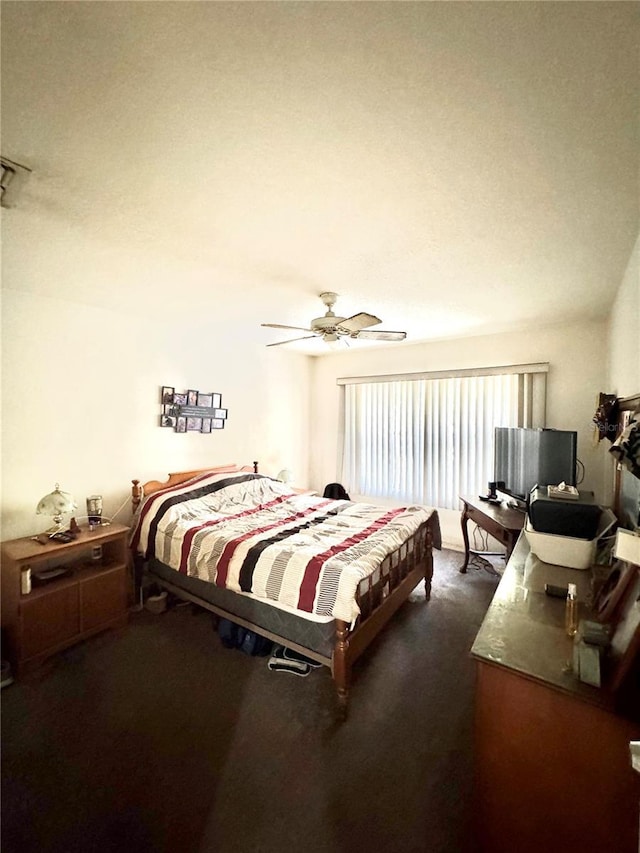 4797 N Lena Dr, Beverly Hills, FL 34465 - bedroom with dark carpet and ceiling fan