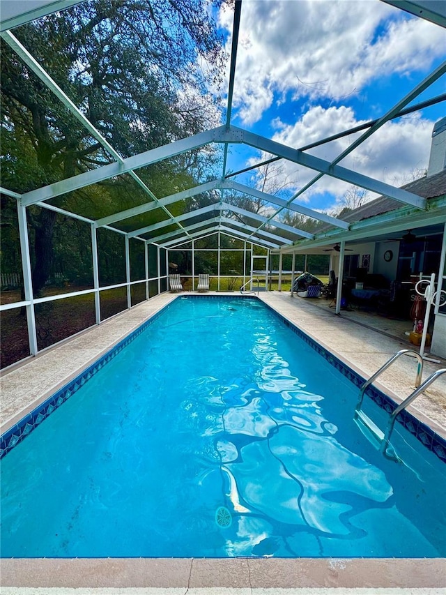 4797 N Lena Dr, Beverly Hills, FL 34465 - outdoor pool featuring a patio area and glass enclosure