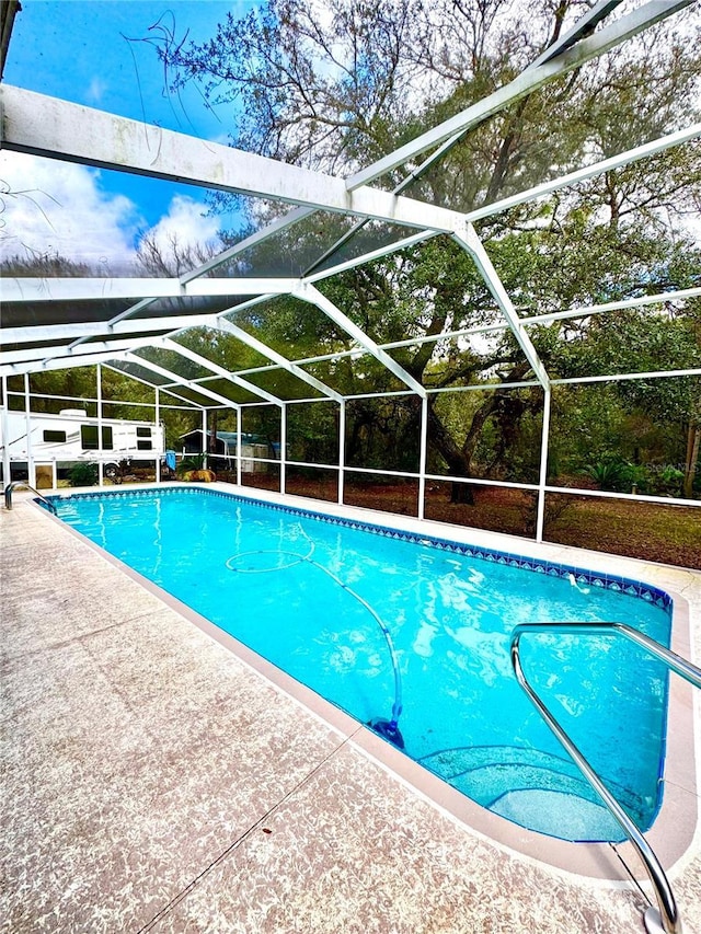 4797 N Lena Dr, Beverly Hills, FL 34465 - pool with glass enclosure and a patio