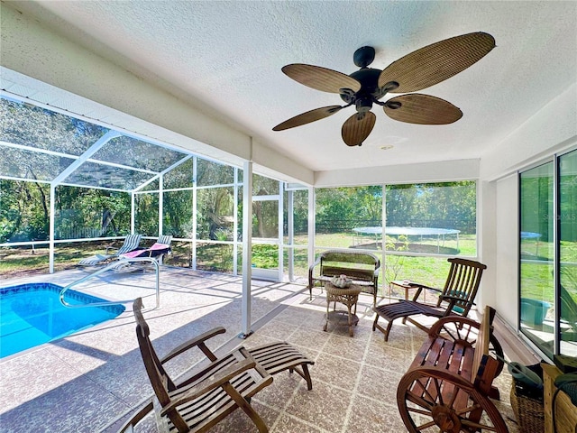 4797 N Lena Dr, Beverly Hills, FL 34465 - sunroom with a ceiling fan, a wealth of natural light, and a swimming pool