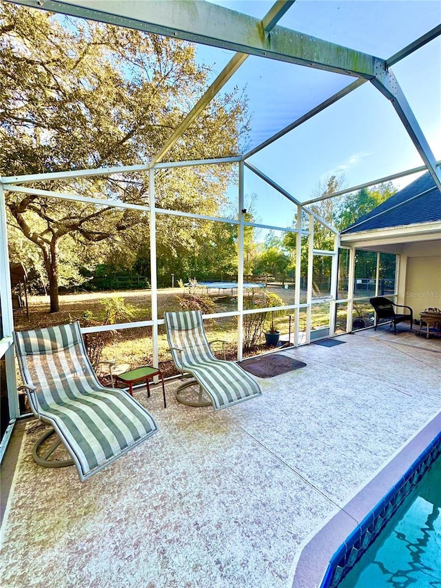 4797 N Lena Dr, Beverly Hills, FL 34465 - view of swimming pool featuring a patio area and glass enclosure