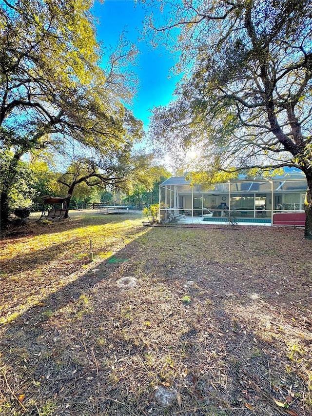 4797 N Lena Dr, Beverly Hills, FL 34465 - view of yard with a pool and glass enclosure
