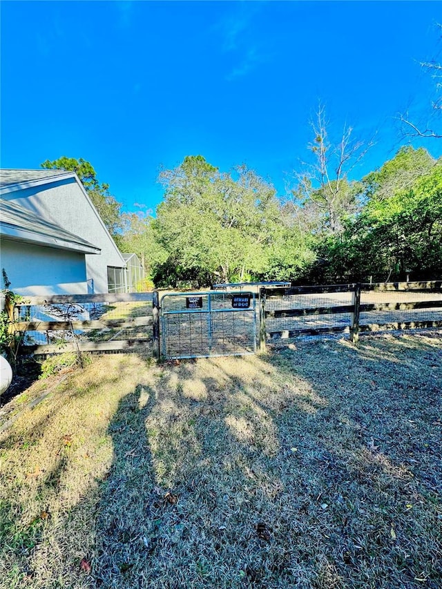4797 N Lena Dr, Beverly Hills, FL 34465 - view of yard with a gate and fence