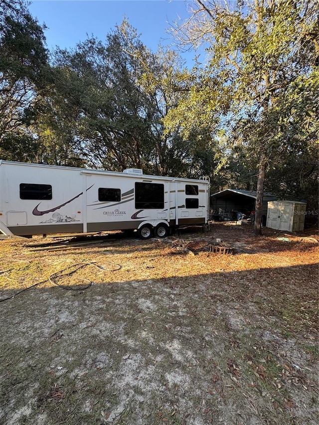 4797 N Lena Dr, Beverly Hills, FL 34465 - view of yard with a carport