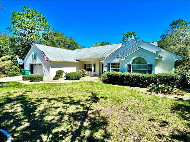 4797 N Lena Dr, Beverly Hills, FL 34465 - single story home featuring a garage, a front lawn, and stucco siding