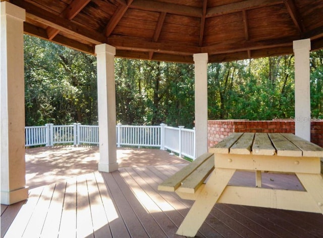 wooden deck featuring a gazebo