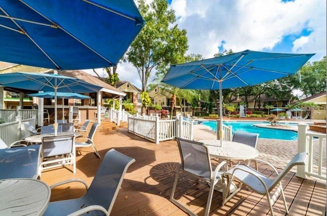 view of patio / terrace with a swimming pool side deck