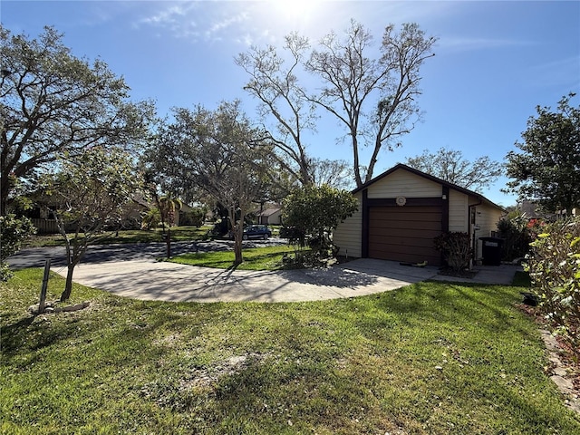 view of yard featuring a garage