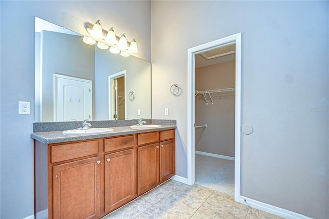 bathroom featuring vanity and tile patterned flooring