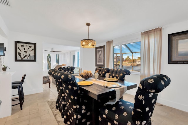 dining area with visible vents and baseboards