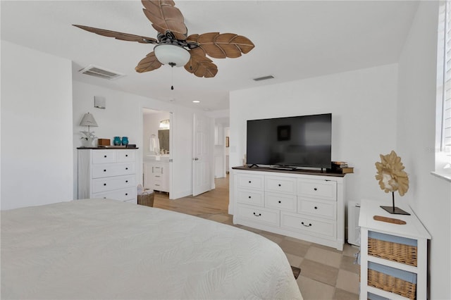 bedroom with visible vents, ensuite bath, and ceiling fan