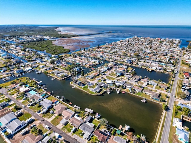 bird's eye view featuring a residential view and a water view