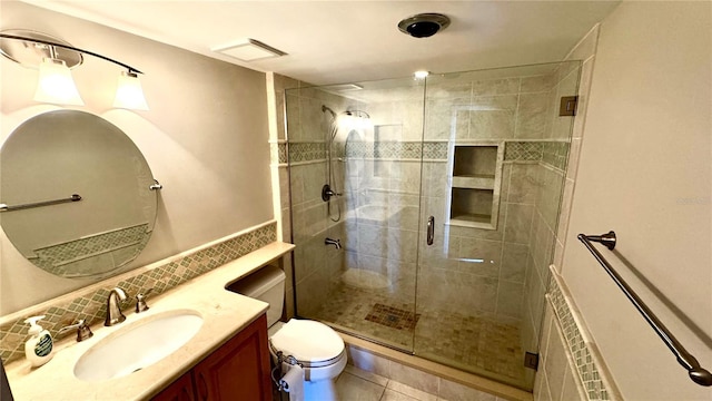 full bath with a stall shower, visible vents, toilet, radiator, and vanity