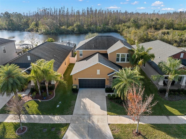 drone / aerial view with a water view