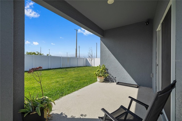 view of patio featuring a fenced backyard