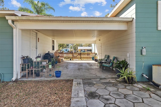 view of patio / terrace featuring a carport