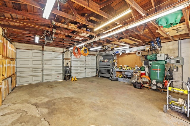 garage featuring a garage door opener