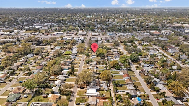 birds eye view of property with a residential view