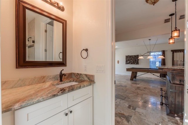 bathroom with vanity and walk in shower