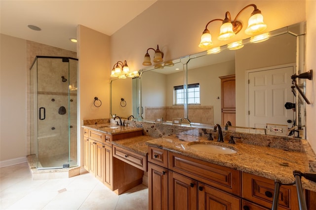 bathroom with vanity, tile patterned flooring, and walk in shower