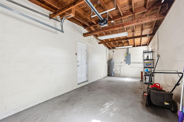 1119 77th St N, Saint Petersburg, FL 33710 - garage with electric panel, a garage door opener, and water heater