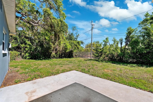 1119 77th St N, Saint Petersburg, FL 33710 - view of yard with a patio area and fence