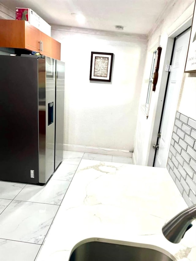 interior space with stainless steel fridge