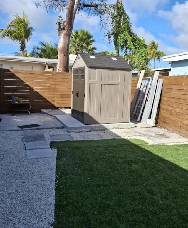 view of outbuilding with a lawn