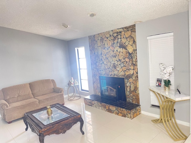 8630 Winter Haven Dr, Hudson, FL 34667 - living room with a textured ceiling, baseboards, and tile patterned floors