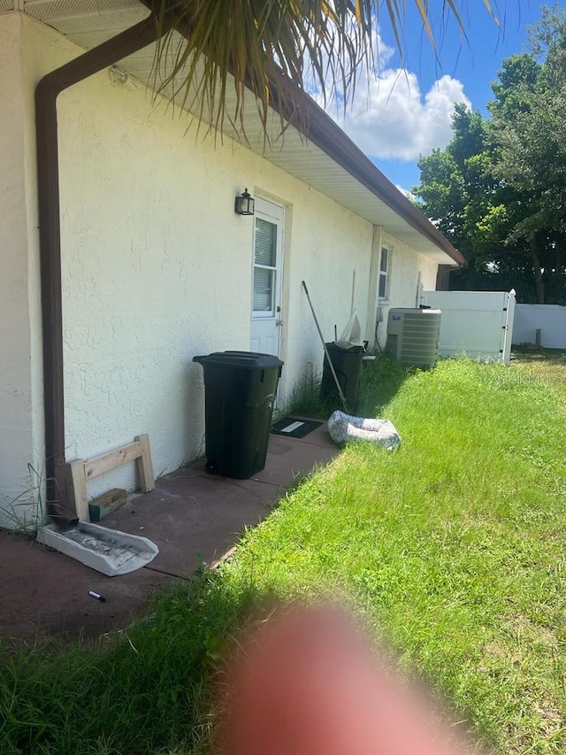 8630 Winter Haven Dr, Hudson, FL 34667 - view of yard with central air condition unit