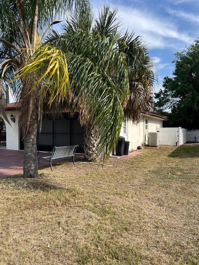 8630 Winter Haven Dr, Hudson, FL 34667 - view of yard with central air condition unit