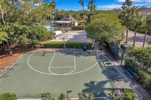 view of sport court with community basketball court and fence