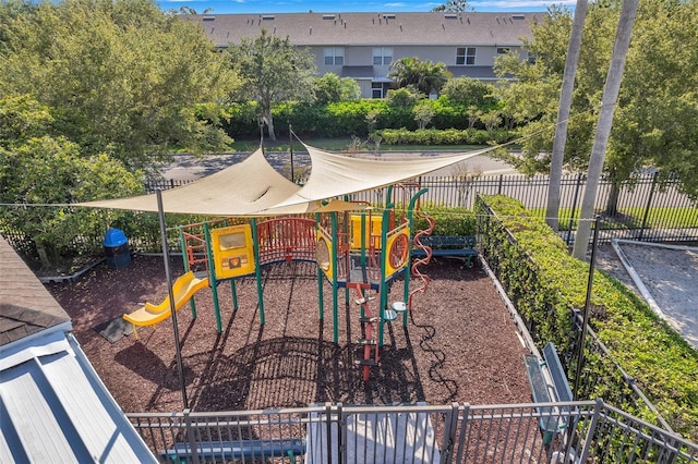 community jungle gym featuring fence