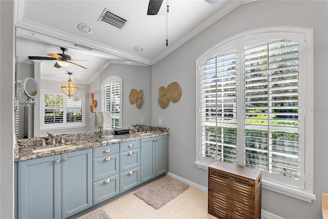 bathroom featuring crown molding, visible vents, ceiling fan, and a sink