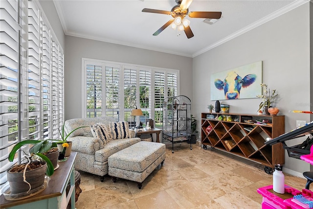 interior space featuring ceiling fan, visible vents, and ornamental molding