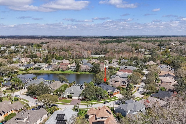 aerial view featuring a residential view and a water view