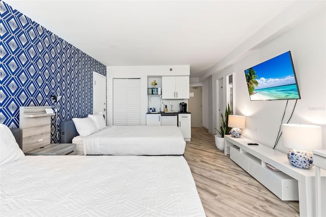 bedroom featuring light wood-type flooring