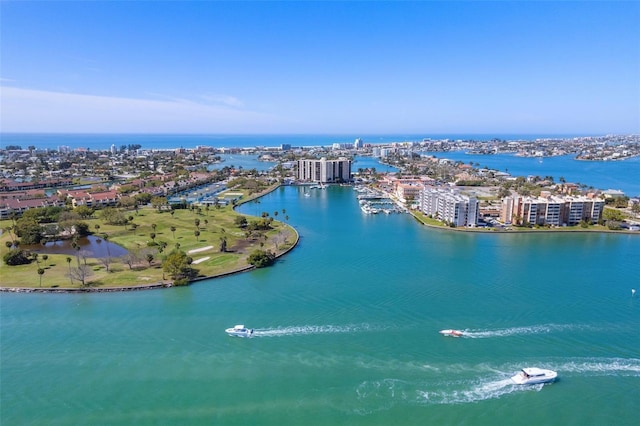 birds eye view of property featuring a view of city and a water view