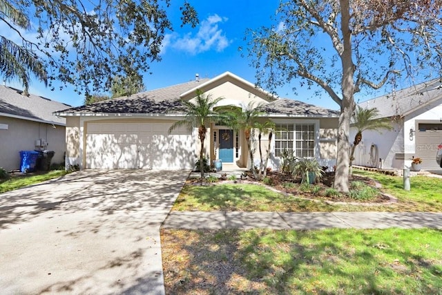 ranch-style house featuring a garage