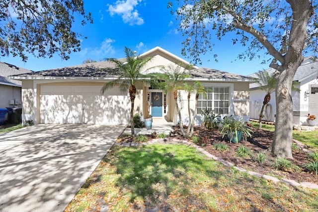 ranch-style house featuring a garage