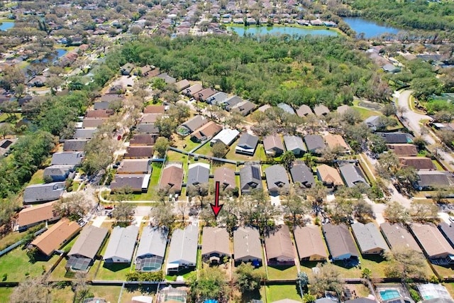 birds eye view of property featuring a water view