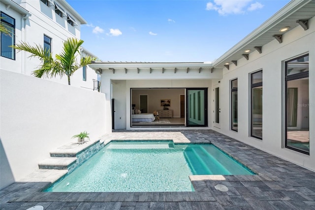 view of pool with a patio