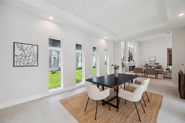 dining area featuring light tile patterned flooring