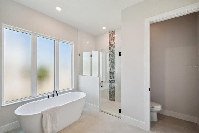 bathroom with tile patterned flooring, plus walk in shower, and toilet