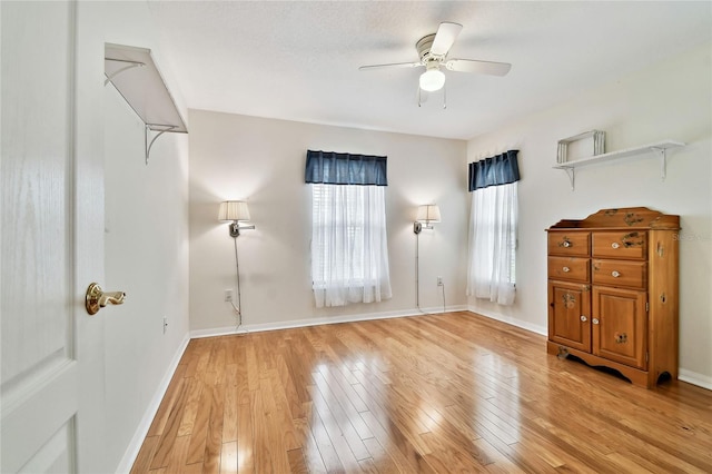 interior space featuring ceiling fan and light hardwood / wood-style floors