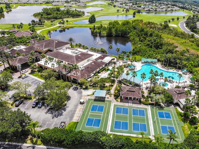 bird's eye view featuring a water view and a residential view